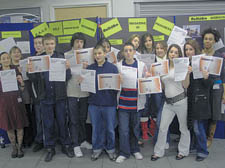 Pupils at Haverstock School with book of grievances forms  