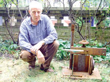 Jonathan Miller with one of his sculptures in 2003 