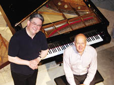 'Starved out of existence' - says pianist John Lil (pictured left) with festival organiser George Vass 