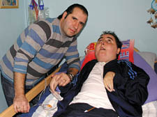 Peter at home with his father Guido after the severe asthma attack 