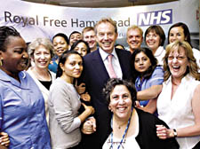 Prime Minister Tony Blair with members of staff on a visit to Hampstead’s Royal Free Hospital, where he saw the new digital imaging system introduced to replace traditional film-based X-rays 
