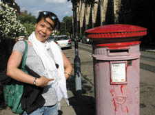 Resident Jani Puradiredja with the less-than-Royal looking post box 