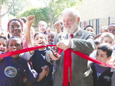 St Pancras MP Frank Dobson cuts the ribbon toopen Rhyl School's new garden area   