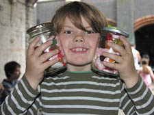 Laurie Macdonald with the guess-the-number sweet jars 