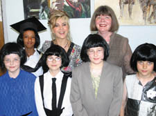 Lesley Garrett (left) and Fleet Primary School teacher Pat Hollister with Anab Abdirahman, Georgia Lowe, Sophie Kandish, Olivia Williams and Robert Hobson