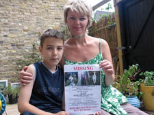 Shirley Nicholas, son Anthony and the poster showing missing Kayla 