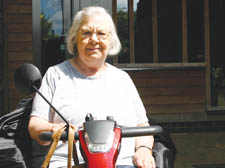 Alice Whitty with her mobility scooter 