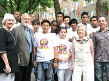 Chairman of Youth In Action Dr June Crown, Frank Dobson MP, Mayor of Camden Dawn Somper and Andre Schott at Saturday's celebrations, pictured with children from the scheme