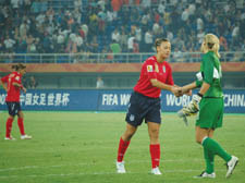 England's Lianne Sanderson shakes hands with US keeper Hope Solo .   Picture: ?Natalia Sollohub 