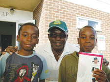 Kristbell Oredugba, 12, and Junior Green, 11, with actor Rudolph Walker