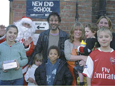 Comedian David Baddiel (centre) joins New End pupils with Parents Teachers Association chairwoman Tracy Longhurst (back right) 