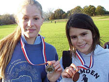 Medal winners Amy-Jane Cotter and Georgia Doolan at Camden Schools Cross-Country event