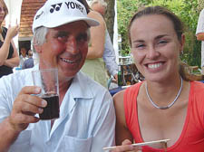 Yuri Ouvarov with tennis champion Martina Hingis at Wimbledon in 2006 