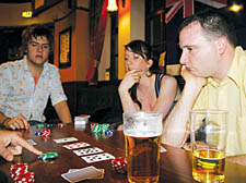 Guy Stafford, Ragnhild Wright Ousland and Richard Steele playing poker at the Royal George pub
