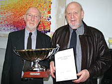 Sons Michael and Lawrence with one of Rose&rsquo;s many awards &ndash; this one for recognising her as the world&rsquo;s oldest working artist