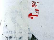 The stencilled artwork after it was defaced, alongside the mysterious message, “ALL THE BEST – VIDA”