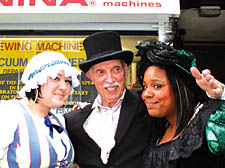 Cyril with staff members Elisha Hughes and Stacey Williams outside his shop