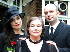 William Hall's widow Jean with the couple's children Juliette and Will on the day of the writer's funeral