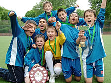 Primrose Hill boys showing off their trophy