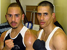 Islington Boxing Club's Darren Ballinger, right, defeated Julius Elie, left