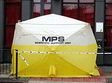 A police forensic tent the scene of the attack in Chalk Farm