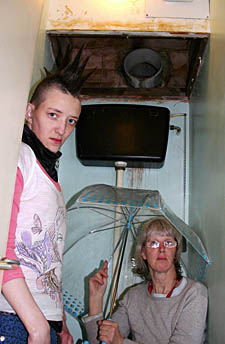 Diana and Laura Molony in their leaky loo