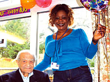Simon Lapp with Rose Bush Court scheme manager Fatima Williams