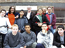 Councillor Theo Blackwell, director Jennifer Dean-Hill, manager Paulo Pires and chairman Peter Watts celebrate news of the refurbishment with youth centre members
