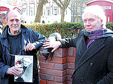 Michael Pountney, left, who helped organise the new sculpture of Sam the cat, with Cllr Brian Woodrow at the unveiling in Queen Square, Holborn