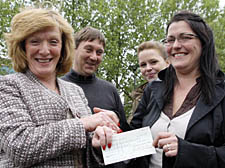 Camden Crawl’s Lisa Paulon (right) hands a £10,000 cheque to Castlehaven’s Eleanor Botwright as the New Journal’s Iain Docherty and Envision’s Jen Noble look on