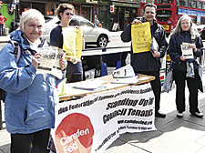 Meric Apak (centre) with fellow campaigners rally support against sales of council homes in Camden Town on Saturday