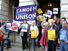 Campaigners who are fighting the sale of Camden Council’s housing stock make their point outside the town hall