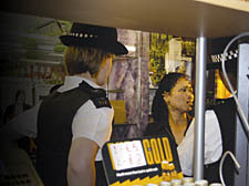 Police officers make their only arrest of the day inside a ‘head shop’ on Camden Town high street during the operation