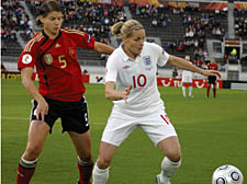 Kelly Smith eludes Annike Krahn in the Euro final against Germany  Picture: Catherine Etoe