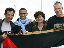 From left: George Ellis, Salah Amaidan, Danielle Smith and Keith Wilson, with the Saharawi people&rsquo;s flag