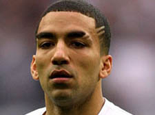 Aaron Lennon limped off shortly before Spurs went down to a disappointing home defeat to Stoke City 