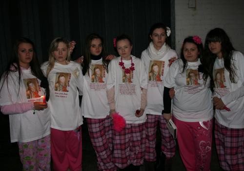 Friends in pink pyjamas at vigil