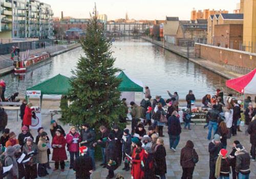 Visitors enjoy the festivities at the new City Road Basin