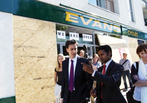 Ed Miliband with Camden Council leader Nash Ali outside Evans Cycles