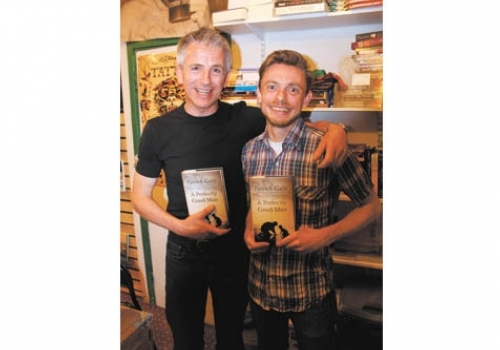 Patrick Gale, left, with bookshop manager Uli Lenart. 