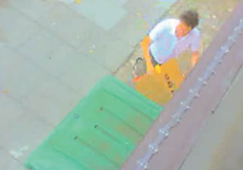 Another man on the website appears to shove boxes down the side of the bin 