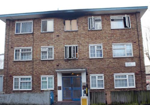 The Agar Grove flats where one resident was left hanging from a window ledge. 