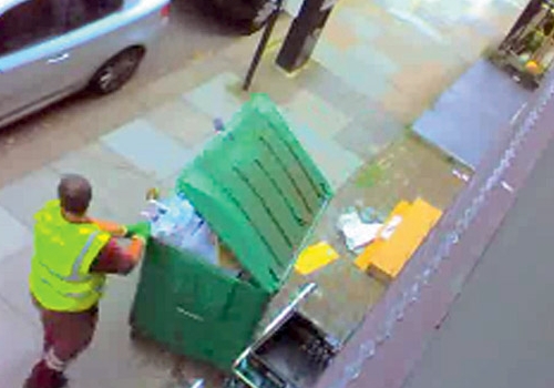 A council worker carries out an ‘unprecedented’ clean-up of the BinCam bin