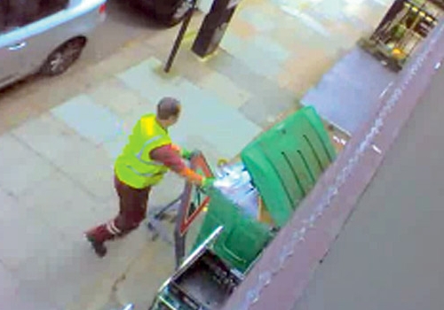A council worker carries out an ‘unprecedented’ clean-up of the BinCam bin