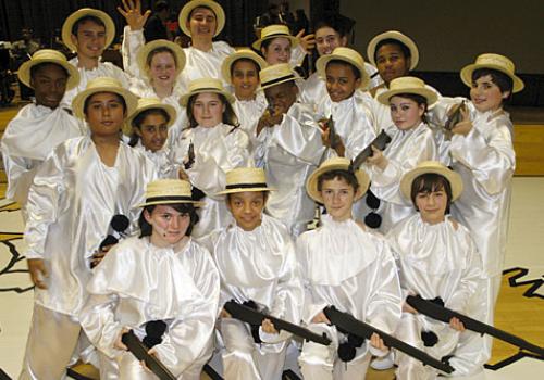 Students from Haverstock School in their traditional Pierrot costumes