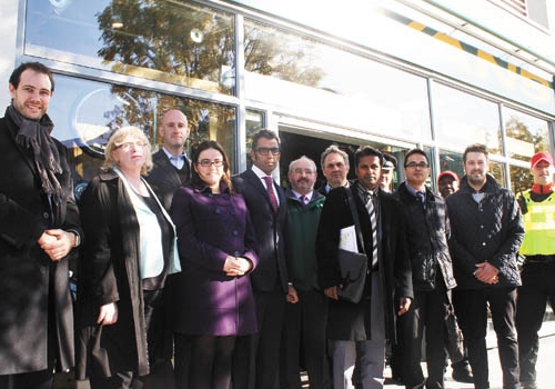 Members of the National Riots Panel outside Evans Cycles in Chalk Farm