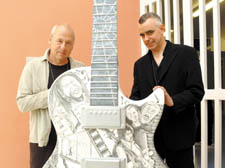 Mark Knopfler with Mike Cahillane of the prison&rsquo;s education team