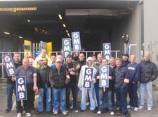 Defiant: workers' picket outside the ICSL premises in Caldedonian Road on Tuesday