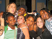 Georgina Stavri surrounded by pupils at her fundraiser birthday party
