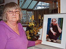 Betty Austin with a photograph of her son Michael